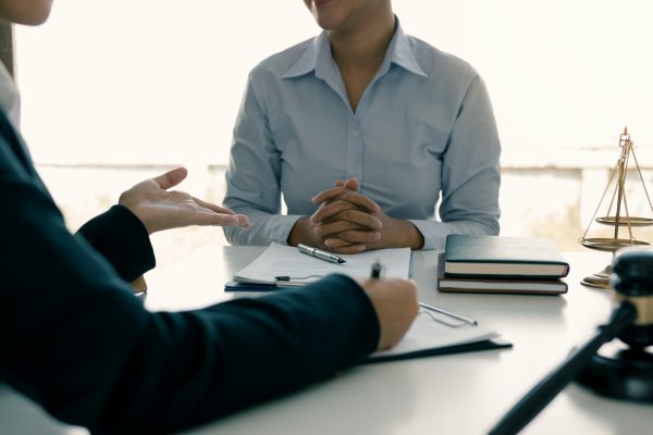 legal-advisor-is-explaining-the-offense-under-the-law-in-the-book-at-office-.jpg legal-advisor-is-explaining-the-offense-under-the-law-in-the-book-at-office-.jpg